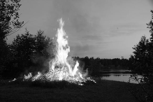 A human wearing a hat spontaneously combusts.