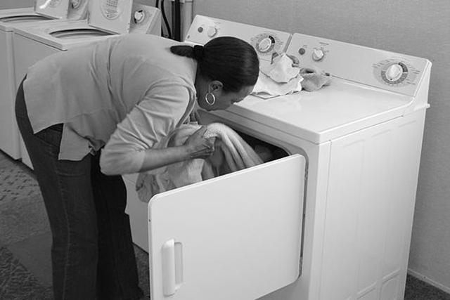 A launderer discovers a coloured sock has violated her white bed-sheets policy.