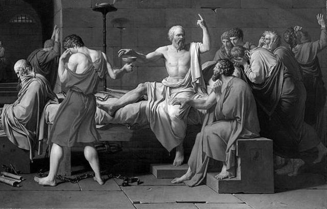 Socrates points out that with so many people in the bed how can anyone be sure those were his wandering hands.